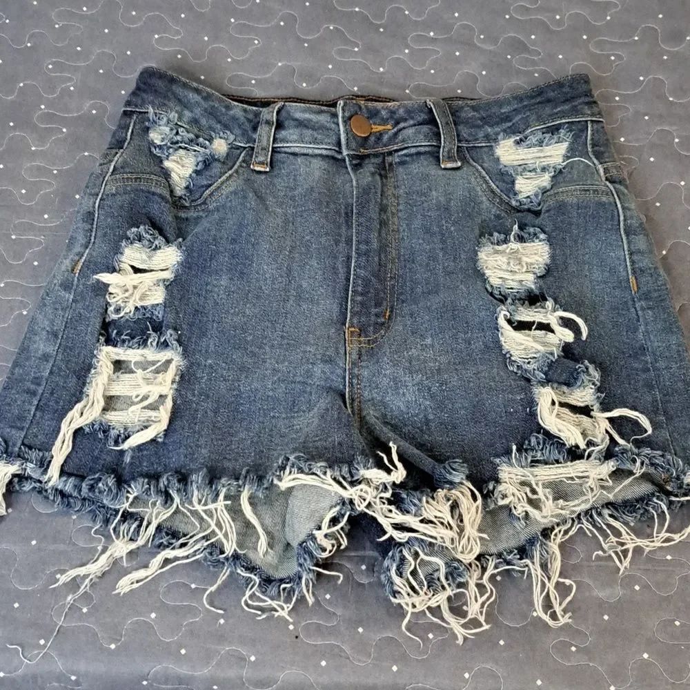 Fashion Nova distressed blue jean shorts size 9